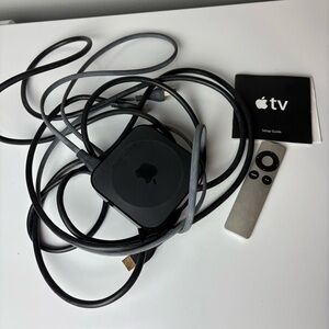 Apple TV 2nd generation black media streamer and remote